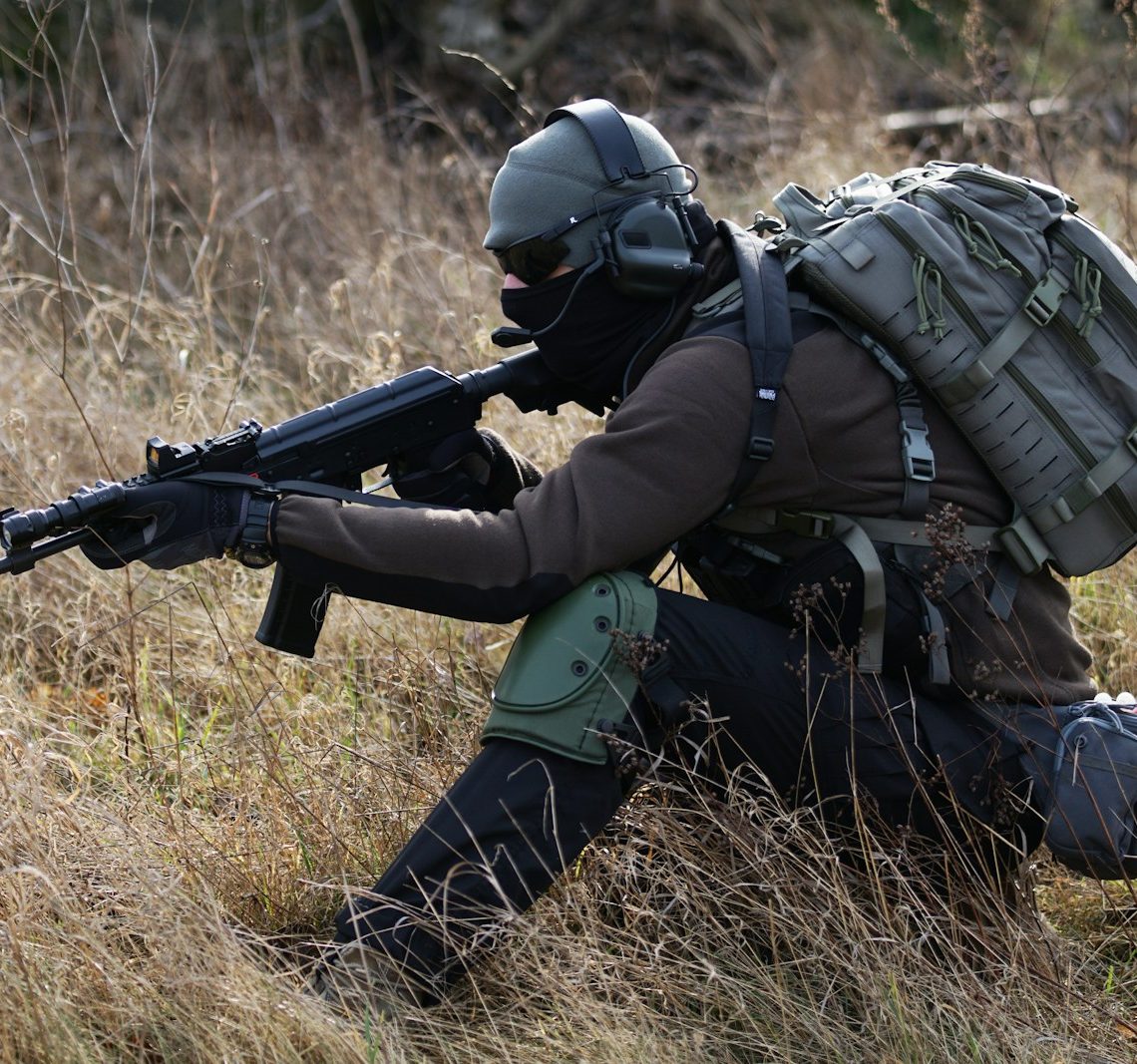 man holding rifle