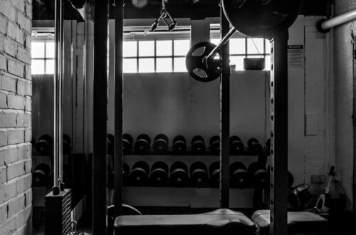exercise equipments in grayscale photography